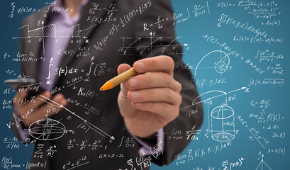 Businessman and analytics symbols on background