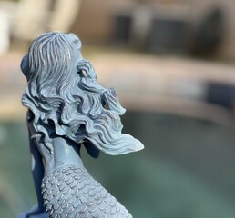 alluring fantasy of a mermaid by the pool