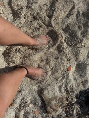 Feet in the sand and in the sea