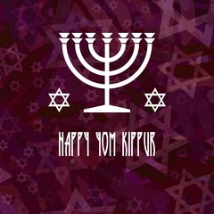Square wish card Happy Yom Kippur written in English with a white candlestick menorah and 2 crosses of David on a purple background with David's cross patterns