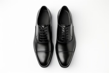 Beautiful black men's classic shoes or suit shoes isolated on white background, top view.generative ai

