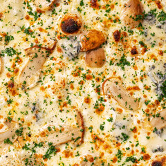 Close-up of pizza filling and texture, white mushrooms and blue cheese on top