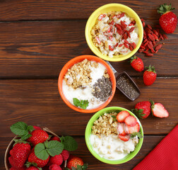 assortment of various breakfast cereals muesli granola with berries and yogurt