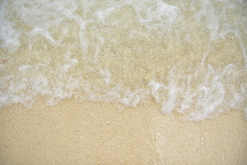 Abstract sandy beach and soft wave background Concept of traveling in Thailand, Phuket