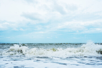 The beautiful sea with the blue sky, the blue color of the water is so soothing and the white foam of the waves is so refreshing.