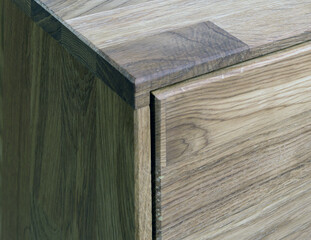 Wooden drawer close view photo, wooden eco furniture elements background. Solid wood furniture...