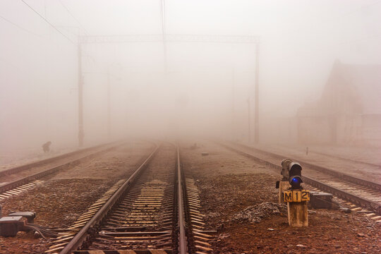 Railway track in the fog