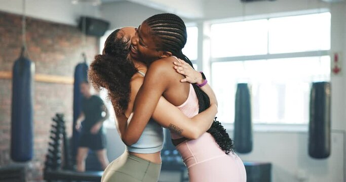 Gym, hug and women with fitness, exercise and celebration with progress, training and wellness. People, girls and friends embrace, support and motivation with workout, congratulations and achievement