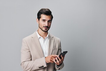 hold man phone call business connection smile smartphone happy suit portrait