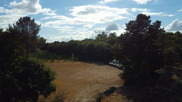 Ancient Cultural Heritage Santalla de Boveda in Galicia, Lugo, Spain. 4k Drone. - Takeoff with sun backlight