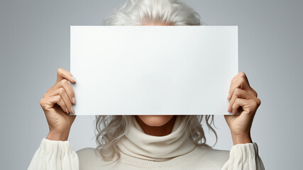 Woman shows white banner, covering her face on white background. Generative AI