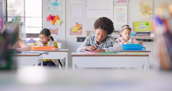 Education, boy and students in a classroom, writing or knowledge with creativity, lessons or notebook. Drawing, children or kids with inspiration, teaching or test with ideas, learning or development