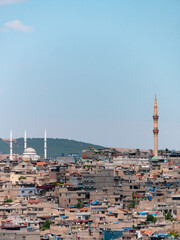 Hills and their dense cityscane surrounding of Gaziantep, Turkey seen from the Old Town  - Portrait shot 2