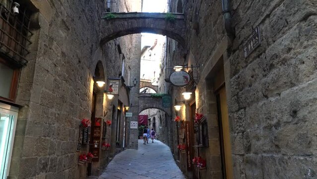 Picturesque narrow street in Volterra old town. Tuscany, Italy. June-20-2023