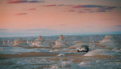 White and Black Desert, Jeep Driving in the Sunset © Kamil Turecki