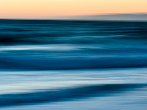 Light painting of seascape in Manhattan Beach, California. Motion blur landscape photo.