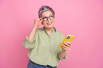 Photo of cute retired businesswoman wear stylish shirt hold phone touch glasses think offer look...