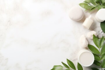 white jar of cream on a white marble background with green leaves scattered around it