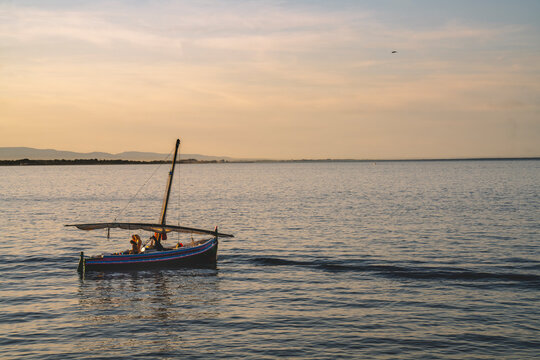 Catalan boat at the sunset