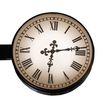 Old wall clock showing six o'clock thirteen minutes