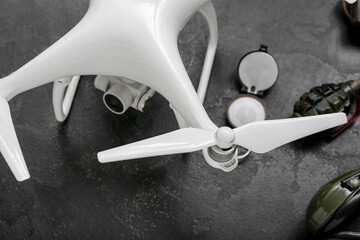Modern quadcopter on black background, closeup