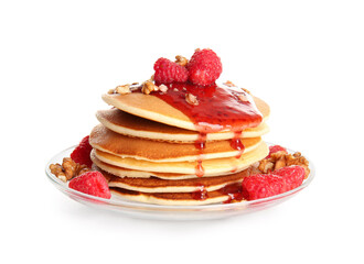 Plate of tasty pancakes with raspberries and nuts on white background