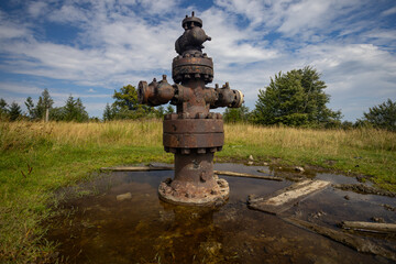 Closed old oil well crane