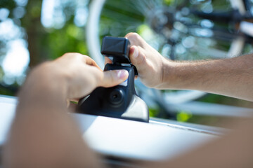 cropped close view of car roof rack mechanism