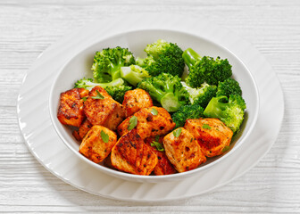 fried salmon bites with steamed broccoli florets