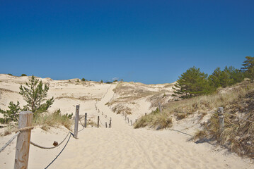 View of endless wandering sand dunes in sunny ,sommer day. Wydma Czolpinska, Slowinski National Park on the Baltic Sea in northern Poland.