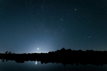 Night landscape with moon in Los Barruecos. Spain.