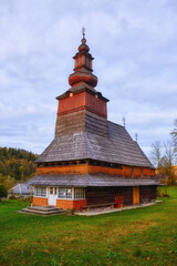 Fototapeta na wymiar A Glimpse of History: Serene Wooden Church in a Picturesque Ukrainian Village
