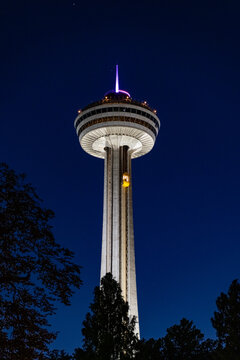 Niagara Park in Niagara Falls, Ontario, Canada, skylon tower view at night with beautiful backlight. High quality photo