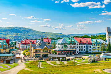 Mont Tremblant, beautiful national park and village in perfect harmony with nature.The unique and wonderful Mont-Tremblant resort village, Quebec, Canada. High quality photo. - obrazy, fototapety, plakaty