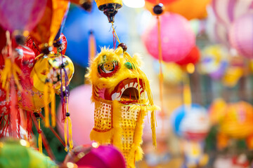 Decorated colorful lanterns hanging on a stand in the streets in Ho Chi Minh City, Vietnam during...