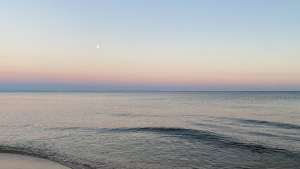 A view from Kefalos (Aydincik) Beach at sunset in Gokceada. It is a sandy beach and one of the most popular beach on the island.