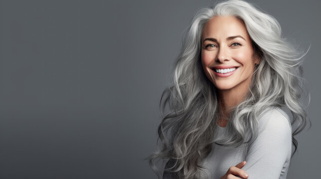 White woman with healthy face, beautiful smile and hair.