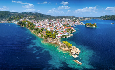 Naklejka premium Panoramic aerial view of the town of Skiathos island, Sporades, Greece, with Bourtzi peninsula and Plakes area in front