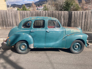 Old vintage car with blue green duco