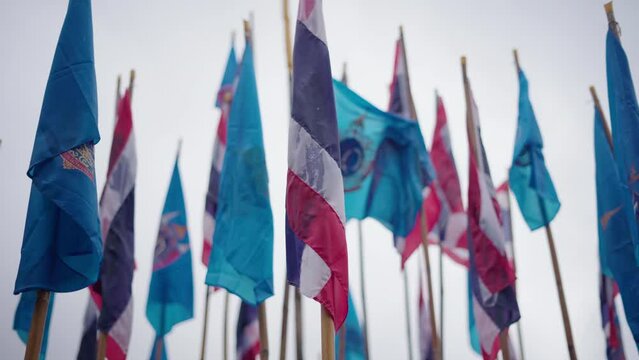 thailand flags at wat phantao temple in chiang mai city while raining