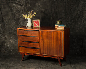 vintage wooden furniture on gray background