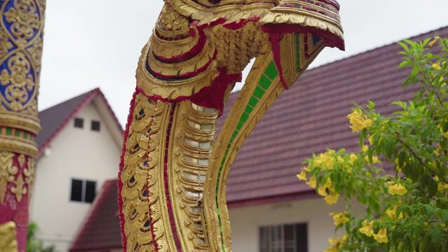 golden snake of wat phra that doi suthep temple in chiang mai, thailand