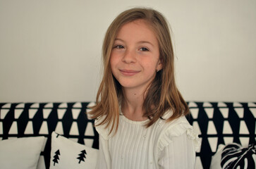 Portrait of a smiling girl at home