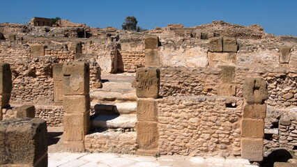 Stone walls and foundations in the Roman bath area of the Roman ruins at Oudna, outside of Tunis, Tunisia