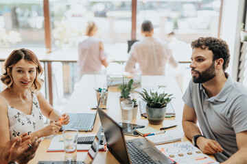 Successful Business Meeting: Analyzing Data and Sharing Ideas for Better Results