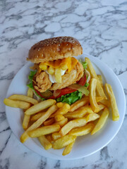 cheese chicken burger and fries