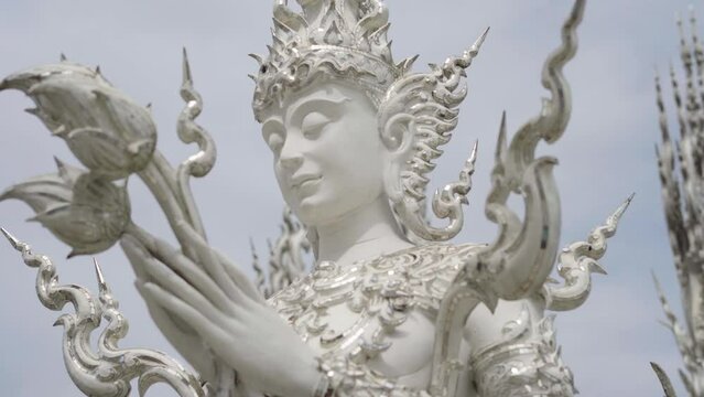sculpture of a deity of the Wat Rong Khun - White Temple in chiang rai, thailand