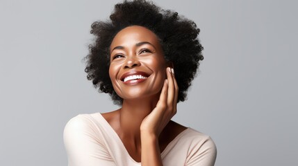 Fototapeta na wymiar Smiling black adult woman touch face with smooth healthy skin. Open healthy smiling beautiful aging mature woman with white teeth. Beauty, dental and cosmetics - generative AI, fiction person