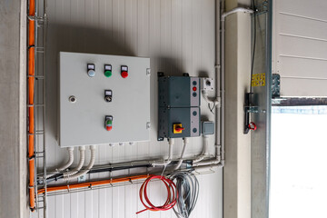 Control units for gates and loading bridges