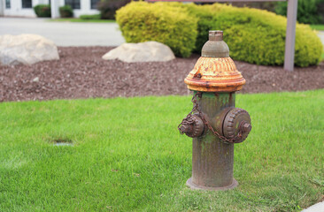 fire hydrant on urban street corner, ready for action amidst city life. Symbol of safety,...